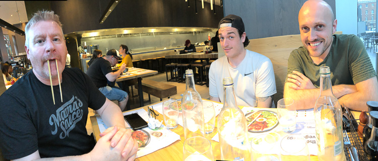 Dave Clayton, Jordan Kelby, and Peter Treadway enjoying a meal in the UK.